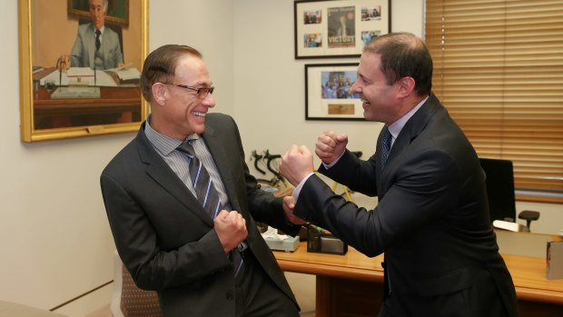 Minister for Environment and Energy Josh Frydenberg with Jean-Claude Van Damme in Parliament House  in Canberra on Thursday.