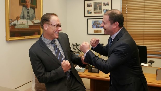 Minister for Environment and Energy Josh Frydenberg with Jean-Claude Van Damme in Parliament House.