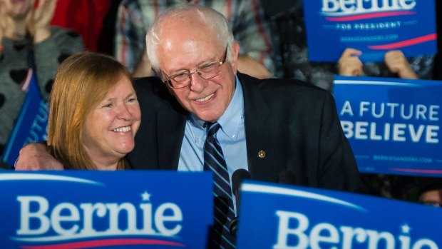 Bernie Sanders hugs his wife Jane after a campaign rally at Grand View University in Des Moines, Iowa.