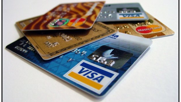 Three men have been charged with a number of offences involving allegedly cloned credit cards.