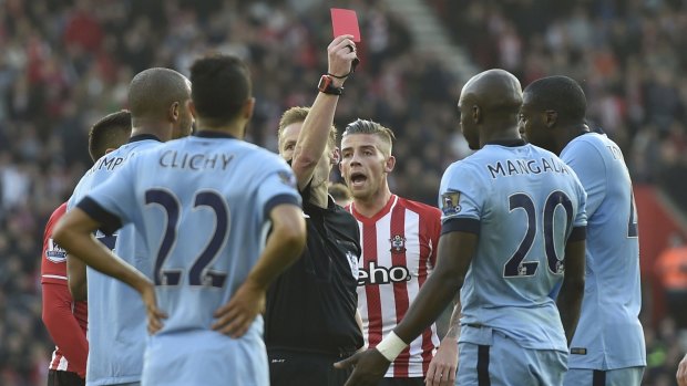Manchester City's Eliaquim Mangala sees red after a second yellow card at St Mary's.