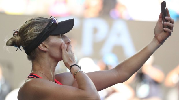 Lucic-Baroni takes a selfie with the centre court crowd. 