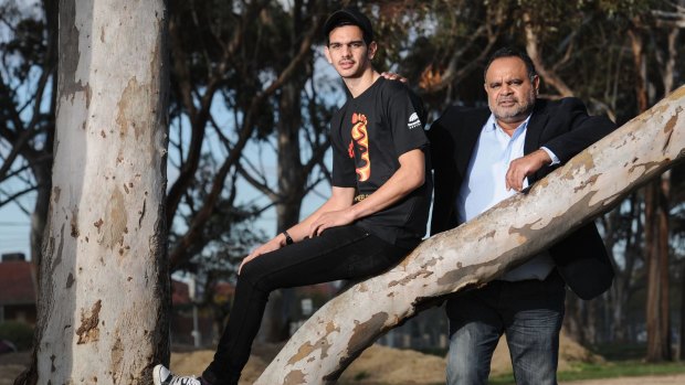 Champion footballer Michael Long with his son, rookie-listed Jake.