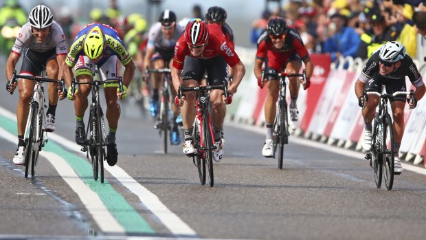 Mark Cavendish, right, looks across as he is beaten to the finish by Andre Greipel, Peter Sagan and Fabian Cancellera.