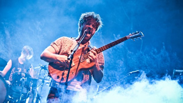 Foals frontman Yannis Philippakis sings in the new year at the relocated Falls Festival at Mount Duneed.
