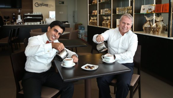 Omar Khan and Patrick Freriks enjoy hot chocolates in the new cafe.