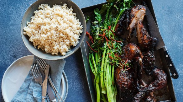Twice-cook duck with charred Asian greens.