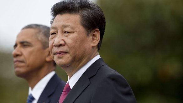Chinese President Xi Jinping, right, and US President Barack Obama on the South Lawn of the White House in Washington. 