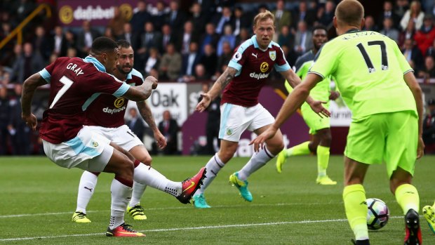 Andre Gray scores for Burnley against Liverpool at Turf Moor.