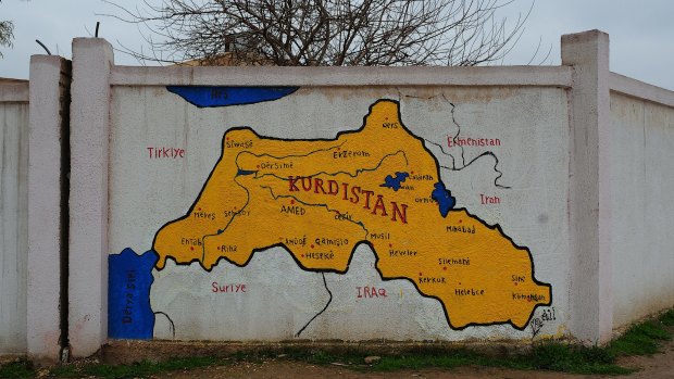 Map of Kurdistan hand-painted on a wall in the main city of Qamishli, in Rojava, north-eastern Syria. 