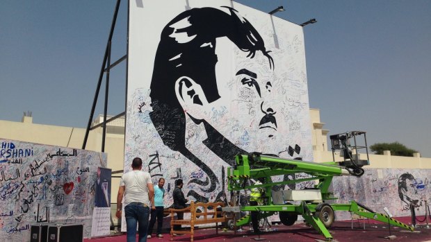A black-and-white depiction of Qatar's emir, Sheikh Tamim bin Hamad Al Thani, attracts signatures and comments of support from residents amid the diplomatic crisis .