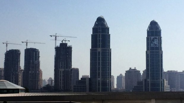Tower cranes in the skyline of Doha.