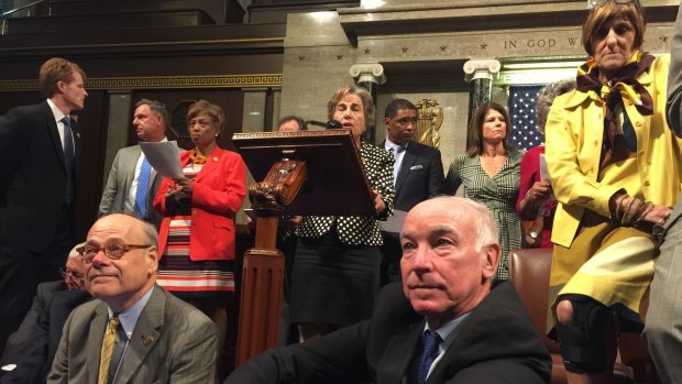 Democrat members of Congress, including, from left, Representatives Steve Cohen, Joe Courtney and Rosa DeLauro in the sit-down protest.