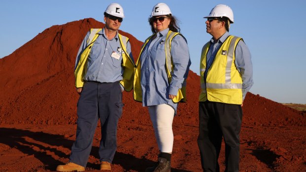 Gina Rinehart (centre) at the $10 billion Roy Hill mine pictured with Barry Fitzgerald (left), chief executive officer of the mine, and Sanjiv Manchanda, project manager. 