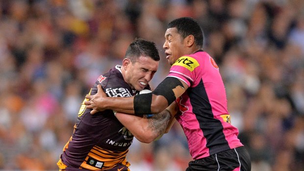 Darius Boyd of the Broncos attempts to break away from the defence during the round nine NRL match between the Brisbane Broncos and the Penrith Panthers at Suncorp Stadium on May 8, 2015 in Brisbane, Australia.  (Photo by Bradley Kanaris/Getty Images)