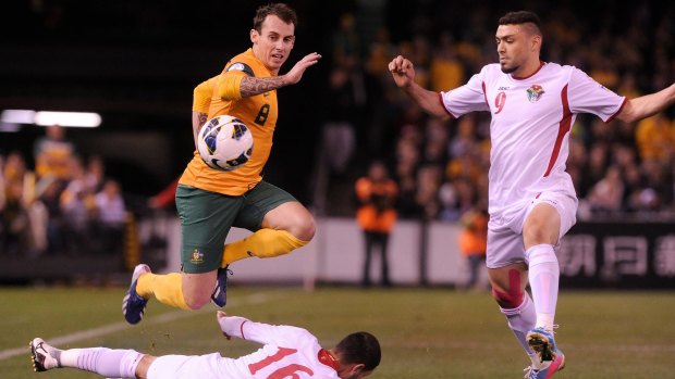 High flyer: Luke Wilkshire in action against Jordan in 2013. 