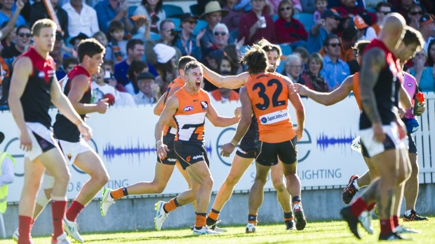 GWS Giants players celebrate a goal during their win against Melbourne earlier this year at Manuka Oval.
