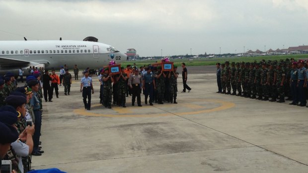 The two bodies arrive at the military airport in Surabaya on Wednesday afternoon on an Indonesian airforce jet.