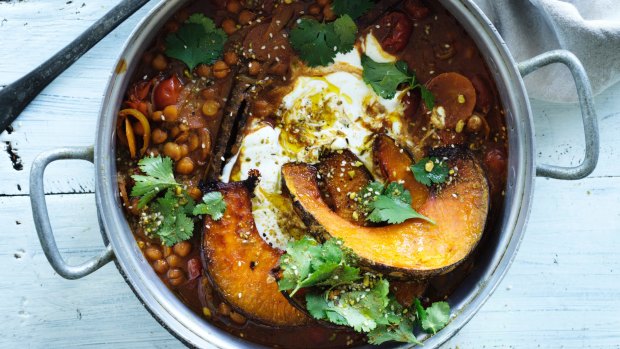 Make the oven do double-duty: Spiced chickpea casserole topped with roast pumpkin wedges.