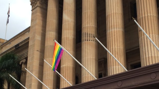 The rainbow flag flies from Brisbane's City Hall.