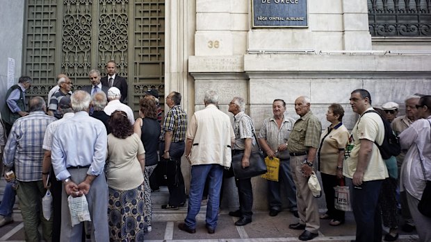 Pensioners line up outside a bank in Athens.