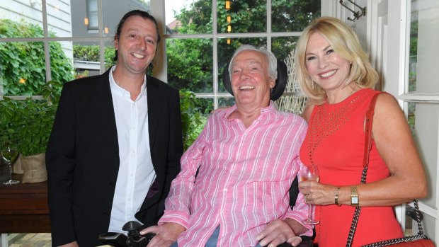 Kerri-Ann Kennerley with husband John and his son Simon at Chiswick's fifth birthday on Tuesday in Woollahra, Sydney.