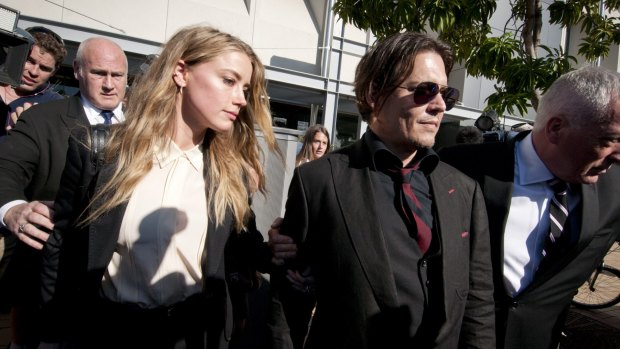 Actor Johnny Depp leaving  with court his wife Amber Heard.