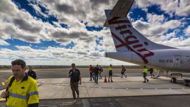 Fly-in, fly-out workers have been blamed for pushing up prices for regional airline seats.