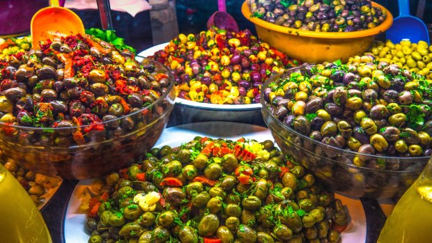 Preserved olives on a stand in the medina.