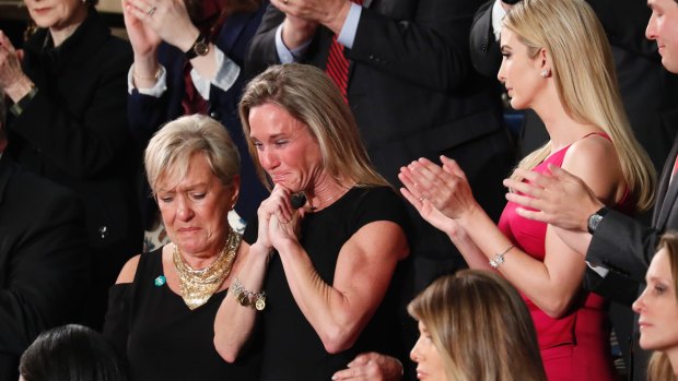 An emotional Carryn Owens, widow of Navy SEAL Ryan Owens, after she was acknowledged by President Donald Trump during his address to a joint session of Congress. 