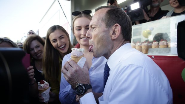 Tony Abbott and his daughters visit the Ekka during the 2013 election campaign.