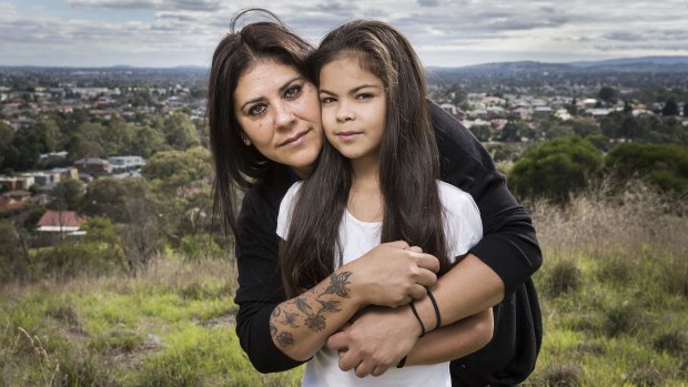 Vicky Vacondios, with her 9-year-old daughter Becky.