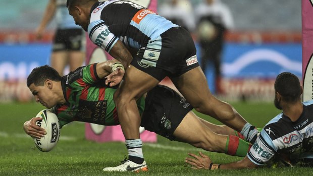 Cody's time to shine: Cody Walker scores a try during the round 24 NRL match between the South Sydney Rabbitohs and the Cronulla Sharks at ANZ Stadium.