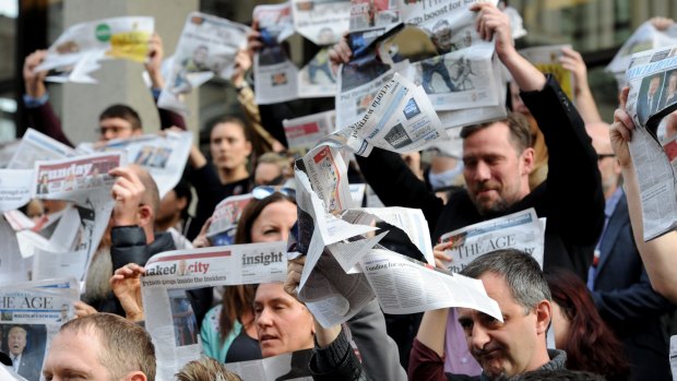 Staff at The Age in Melbourne walk out in protest at Fairfax Media's staff cuts.