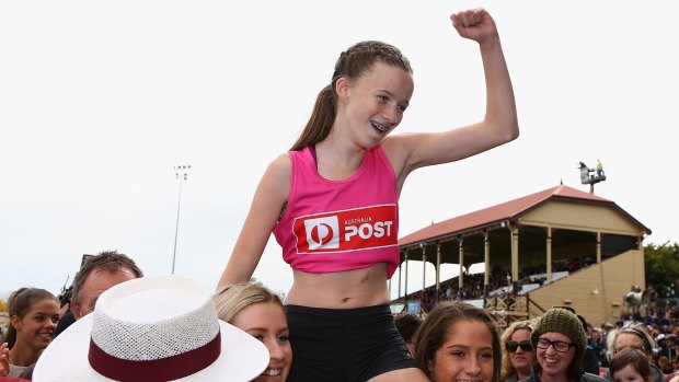 Talia Martin (pink) won the women's Stawell Gift in controversial fashion.