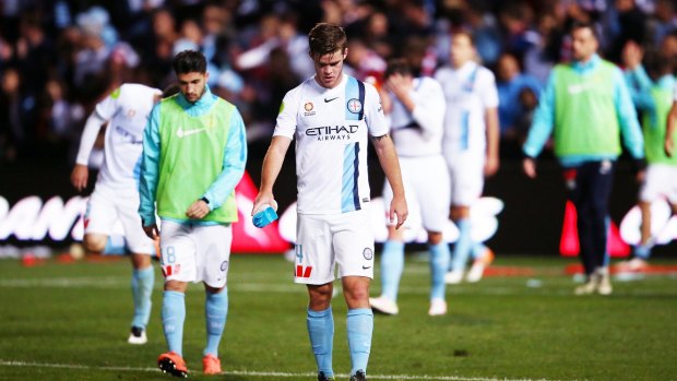 Dejected Melbourne City players after the semi-final loss to Adelaide United.