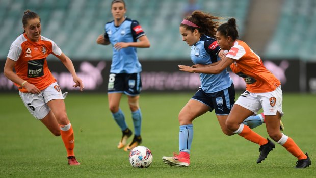 Shackled: Sydney FC's Julia Vignes is pressured by Allira Toby.
