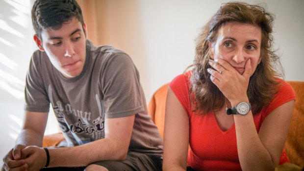 Lucky to be a two-job family: Katerina Bomou with her son Jason, 16.