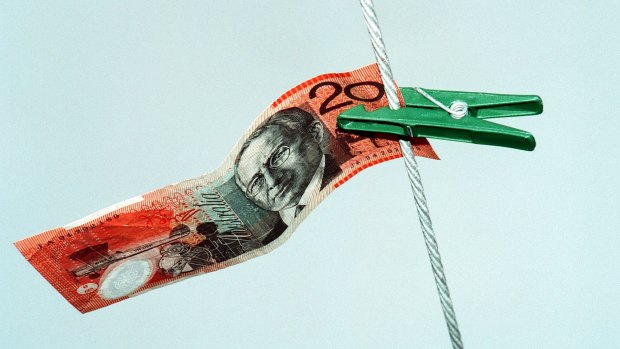 Crime groups are washing millions a day of dirty money through Australia's big banks.