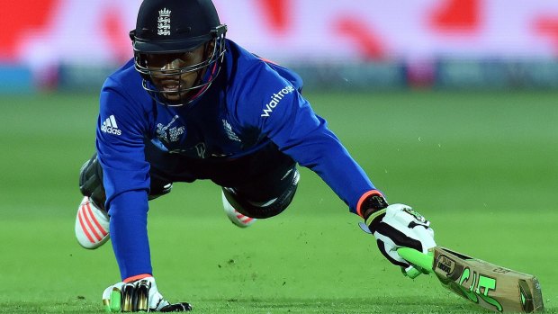 England's Chris Jordan tries to make his ground but was given out.