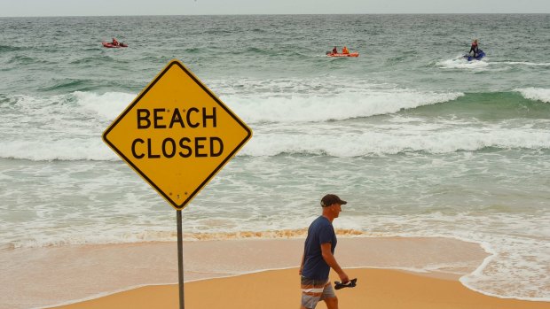 Curl Curl beach has been closed as authorities search for a missing man on Sunday. 