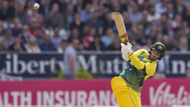 Big shot: Australia's Matthew Wade hits out against England's David Willey.