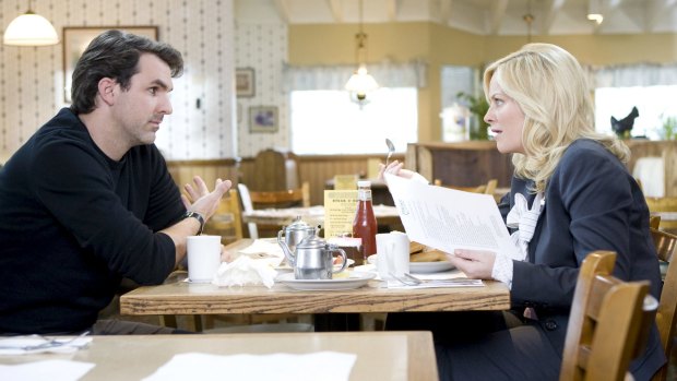 Parks and Recreation's Paul Schneider and Amy Poehler in JJ's Diner, home of famous (but unfortunately fictional) waffles.