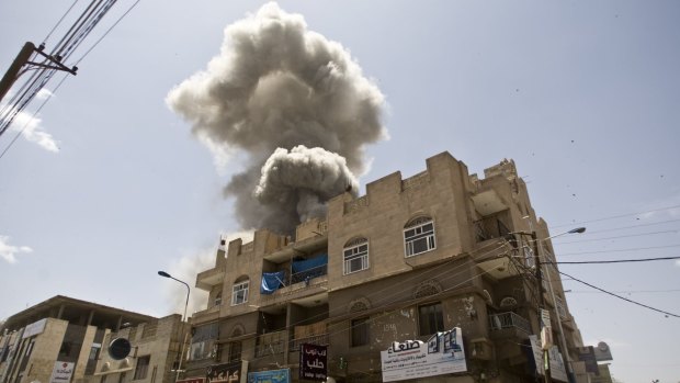 Smoke rises from a house of former Yemeni president Ali Abdullah Saleh after a Saudi-led air strike in the capital Sanaa in May.