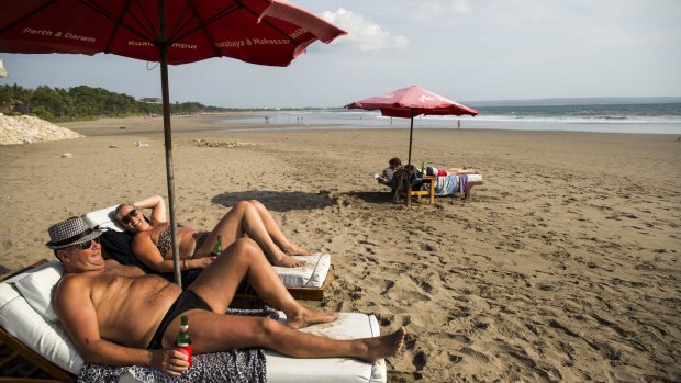 Tourists relax in Bali.