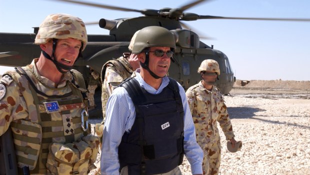 Paul Symon with then-Defence minister Brendan Nelson in southern Iraq in 2006. 