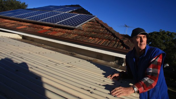 Peter Thompson with solar panels on the roof of his home in Miranda. There is no planned change to the popular roof-top solar scheme.
