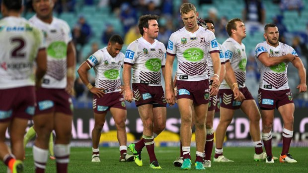 Sore one: Manly players show their dejection after Tom Trbojevic's mistake allowed Canterbury's Josh Reynolds to score the match-winning try.