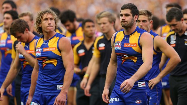 The grand final loss left the Eagles dejected.