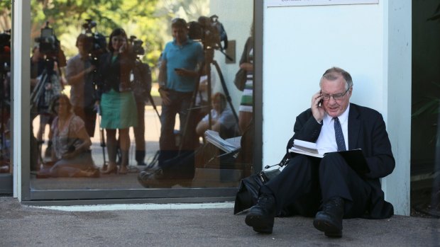 Former <em>Sydney Morning Herald</em> journalist Malcolm Brown filing his copy on December 24, 2012, at the conclusion of the story he had been covering for more than 30 years, as the Northern Territory coroner ruled that Azaria Chamberlain was taken by a dingo at Uluru in 1980.  